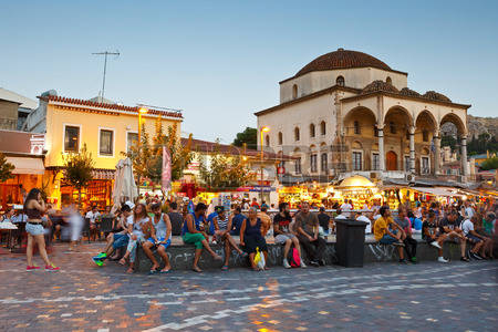 43801074-people-sitting-in-the-square-in-front-of-the-mosque-in-monastiraki-athens